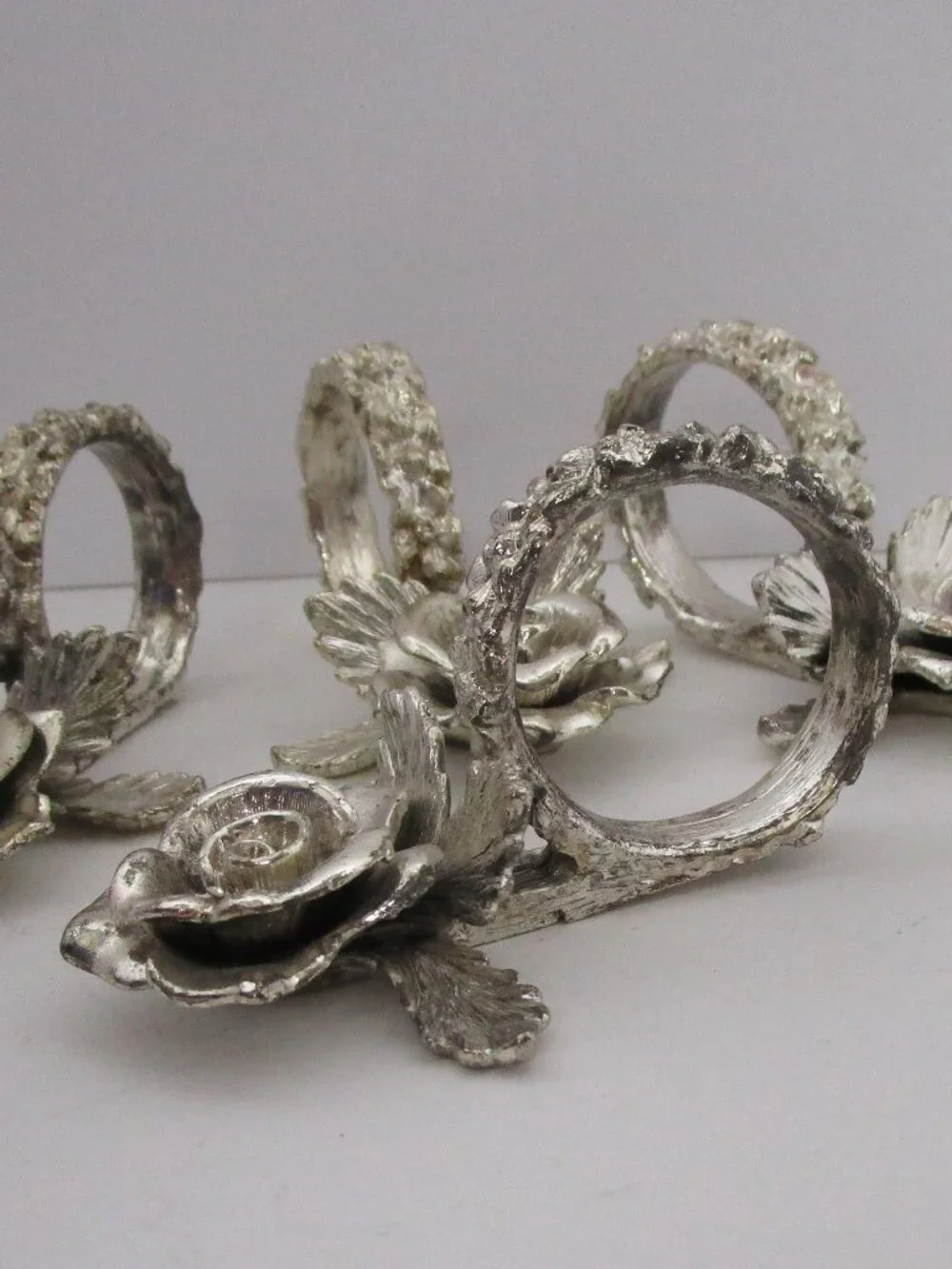heavy molded metal napkin ring set